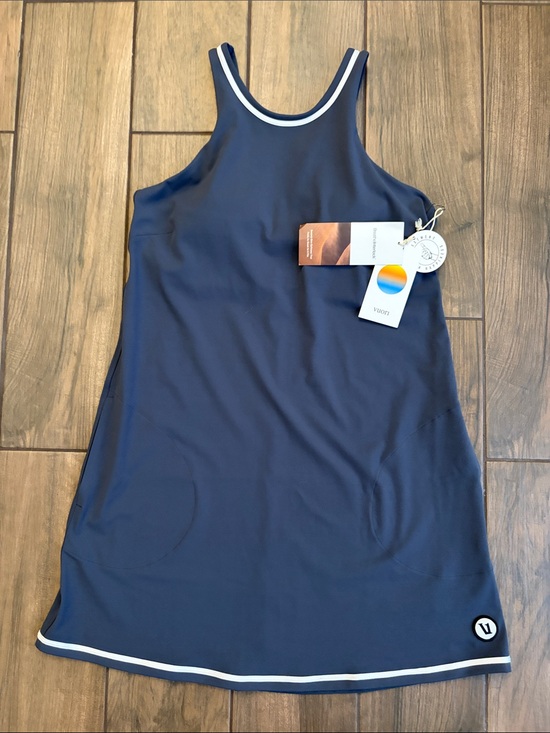 Vuori Dresses & Skirts - NWT Vuori Volley dress in azure blue featuring white trim and a built in bra